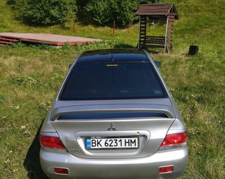 Серый Мицубиси Лансер, объемом двигателя 1.6 л и пробегом 350 тыс. км за 3600 $, фото 4 на Automoto.ua