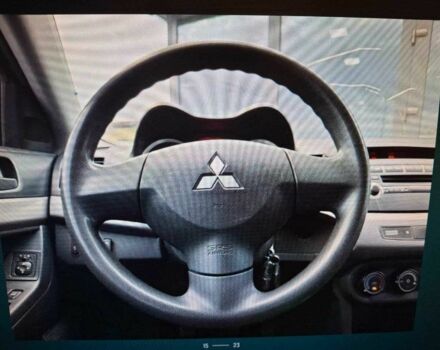 Серый Мицубиси Лансер, объемом двигателя 1.5 л и пробегом 235 тыс. км за 6500 $, фото 8 на Automoto.ua