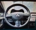 Серый Мицубиси Лансер, объемом двигателя 1.5 л и пробегом 235 тыс. км за 6500 $, фото 8 на Automoto.ua