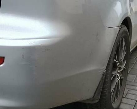 Серый Мицубиси Лансер, объемом двигателя 1.5 л и пробегом 230 тыс. км за 6300 $, фото 4 на Automoto.ua