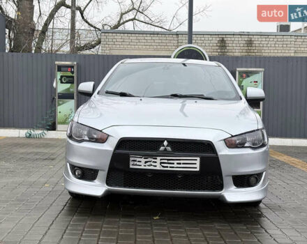 Серый Мицубиси Лансер, объемом двигателя 2 л и пробегом 220 тыс. км за 6500 $, фото 1 на Automoto.ua