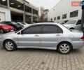 Сірий Міцубісі Lancer, об'ємом двигуна 1.6 л та пробігом 206 тис. км за 4799 $, фото 3 на Automoto.ua