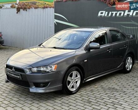 Серый Мицубиси Лансер, объемом двигателя 2 л и пробегом 230 тыс. км за 6900 $, фото 3 на Automoto.ua