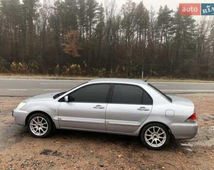 Серый Мицубиси Лансер, объемом двигателя 1.58 л и пробегом 268 тыс. км за 3450 $, фото 3 на Automoto.ua