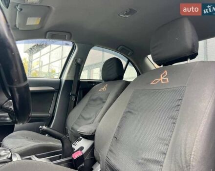 Серый Мицубиси Лансер, объемом двигателя 1.5 л и пробегом 239 тыс. км за 6000 $, фото 15 на Automoto.ua