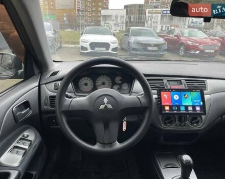 Серый Мицубиси Лансер, объемом двигателя 1.58 л и пробегом 146 тыс. км за 5490 $, фото 13 на Automoto.ua