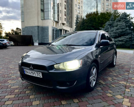 Серый Мицубиси Лансер, объемом двигателя 2 л и пробегом 212 тыс. км за 6000 $, фото 18 на Automoto.ua