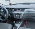 Серый Мицубиси Лансер, объемом двигателя 1.6 л и пробегом 155 тыс. км за 6000 $, фото 6 на Automoto.ua
