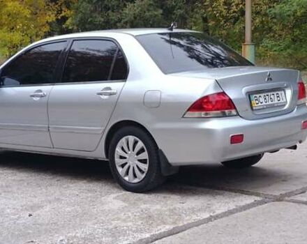 Сірий Міцубісі Lancer, об'ємом двигуна 1.6 л та пробігом 176 тис. км за 4999 $, фото 7 на Automoto.ua