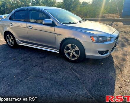 Серый Мицубиси Лансер, объемом двигателя 2 л и пробегом 151 тыс. км за 6099 $, фото 2 на Automoto.ua