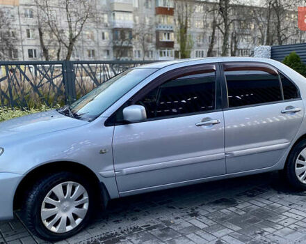 Серый Мицубиси Лансер, объемом двигателя 1.6 л и пробегом 203 тыс. км за 5200 $, фото 2 на Automoto.ua