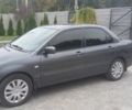 Серый Мицубиси Лансер, объемом двигателя 1.6 л и пробегом 188 тыс. км за 5700 $, фото 1 на Automoto.ua