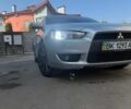 Серый Мицубиси Лансер, объемом двигателя 2 л и пробегом 119 тыс. км за 6499 $, фото 6 на Automoto.ua