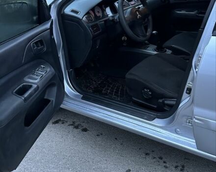 Сірий Міцубісі Lancer, об'ємом двигуна 1.6 л та пробігом 180 тис. км за 3900 $, фото 4 на Automoto.ua