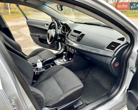 Сірий Міцубісі Lancer, об'ємом двигуна 2 л та пробігом 225 тис. км за 6890 $, фото 15 на Automoto.ua