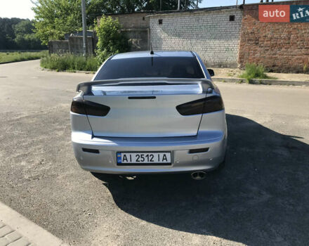 Серый Мицубиси Лансер, объемом двигателя 2 л и пробегом 256 тыс. км за 7000 $, фото 4 на Automoto.ua