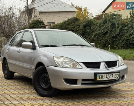 Сірий Міцубісі Lancer, об'ємом двигуна 1.6 л та пробігом 221 тис. км за 3650 $, фото 9 на Automoto.ua