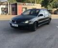 Сірий Міцубісі Lancer, об'ємом двигуна 1.6 л та пробігом 145 тис. км за 3502 $, фото 1 на Automoto.ua
