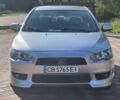 Сірий Міцубісі Lancer, об'ємом двигуна 1.5 л та пробігом 200 тис. км за 3506 $, фото 1 на Automoto.ua