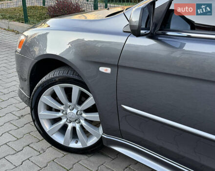 Сірий Міцубісі Lancer, об'ємом двигуна 2 л та пробігом 92 тис. км за 9800 $, фото 21 на Automoto.ua