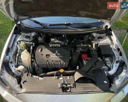 Серый Мицубиси Лансер, объемом двигателя 2 л и пробегом 112 тыс. км за 7900 $, фото 26 на Automoto.ua