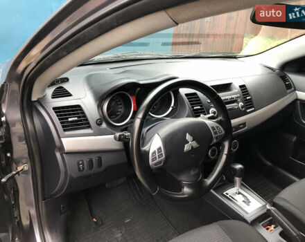 Сірий Міцубісі Lancer, об'ємом двигуна 2 л та пробігом 187 тис. км за 8000 $, фото 20 на Automoto.ua