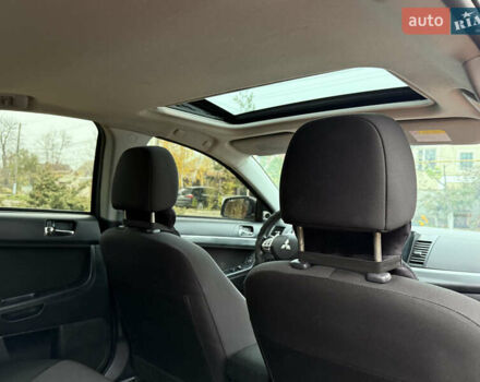 Сірий Міцубісі Lancer, об'ємом двигуна 2 л та пробігом 92 тис. км за 8200 $, фото 37 на Automoto.ua