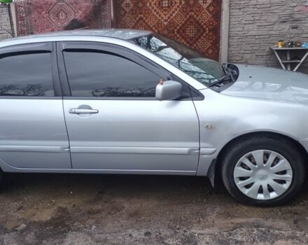 Сірий Міцубісі Lancer, об'ємом двигуна 1.6 л та пробігом 320 тис. км за 4167 $, фото 2 на Automoto.ua