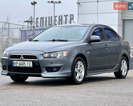 Серый Мицубиси Лансер, объемом двигателя 2 л и пробегом 203 тыс. км за 4999 $, фото 1 на Automoto.ua