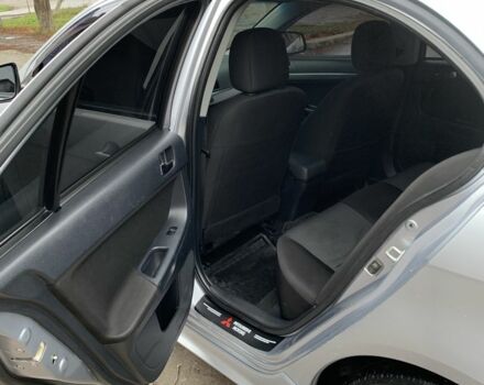 Серый Мицубиси Лансер, объемом двигателя 2 л и пробегом 220 тыс. км за 6000 $, фото 5 на Automoto.ua