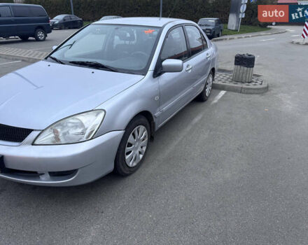 Серый Мицубиси Лансер, объемом двигателя 1.58 л и пробегом 330 тыс. км за 3500 $, фото 17 на Automoto.ua