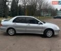 Сірий Міцубісі Lancer, об'ємом двигуна 1.6 л та пробігом 254 тис. км за 3800 $, фото 3 на Automoto.ua