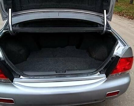 Серый Мицубиси Лансер, объемом двигателя 1.58 л и пробегом 176 тыс. км за 5000 $, фото 15 на Automoto.ua