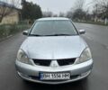 Сірий Міцубісі Lancer, об'ємом двигуна 1.6 л та пробігом 222 тис. км за 4300 $, фото 1 на Automoto.ua