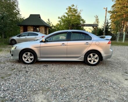 Серый Мицубиси Лансер, объемом двигателя 2 л и пробегом 223 тыс. км за 6890 $, фото 2 на Automoto.ua