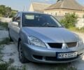Сірий Міцубісі Lancer, об'ємом двигуна 1.6 л та пробігом 182 тис. км за 4200 $, фото 1 на Automoto.ua