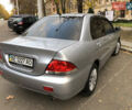Мицубиси Лансер 2008 в Николаеве на Automoto.ua Серый Мицубиси Лансер, объемом двигателя 1.58 л и пробегом 132 тыс. км за 5900 $, фото 14 на Automoto.ua