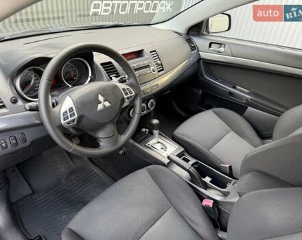 Серый Мицубиси Лансер, объемом двигателя 2 л и пробегом 230 тыс. км за 6900 $, фото 38 на Automoto.ua