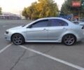 Серый Мицубиси Лансер, объемом двигателя 2 л и пробегом 225 тыс. км за 8200 $, фото 11 на Automoto.ua