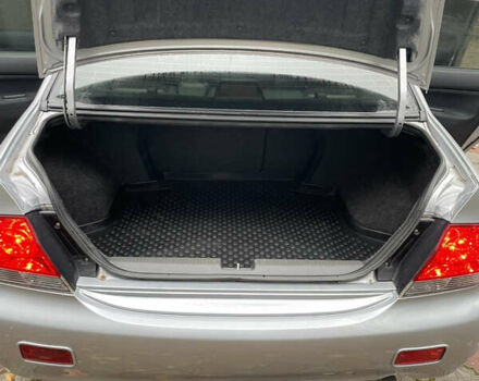 Сірий Міцубісі Lancer, об'ємом двигуна 1.59 л та пробігом 219 тис. км за 4500 $, фото 19 на Automoto.ua