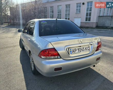Серый Мицубиси Лансер, объемом двигателя 1.6 л и пробегом 193 тыс. км за 4000 $, фото 6 на Automoto.ua