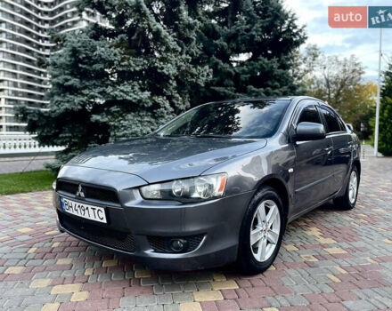Серый Мицубиси Лансер, объемом двигателя 2 л и пробегом 212 тыс. км за 6000 $, фото 1 на Automoto.ua