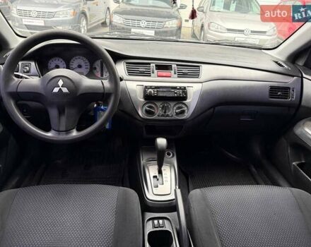 Сірий Міцубісі Lancer, об'ємом двигуна 1.6 л та пробігом 206 тис. км за 4799 $, фото 21 на Automoto.ua