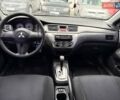 Сірий Міцубісі Lancer, об'ємом двигуна 1.6 л та пробігом 206 тис. км за 4799 $, фото 21 на Automoto.ua