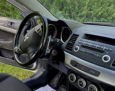 Серый Мицубиси Лансер, объемом двигателя 2 л и пробегом 112 тыс. км за 7900 $, фото 20 на Automoto.ua