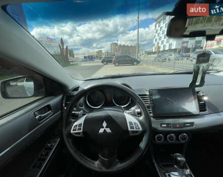 Серый Мицубиси Лансер, объемом двигателя 2 л и пробегом 265 тыс. км за 5500 $, фото 6 на Automoto.ua