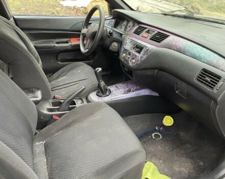 Серый Мицубиси Лансер, объемом двигателя 1.6 л и пробегом 280 тыс. км за 900 $, фото 5 на Automoto.ua