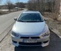 Серый Мицубиси Лансер, объемом двигателя 2 л и пробегом 269 тыс. км за 5000 $, фото 1 на Automoto.ua
