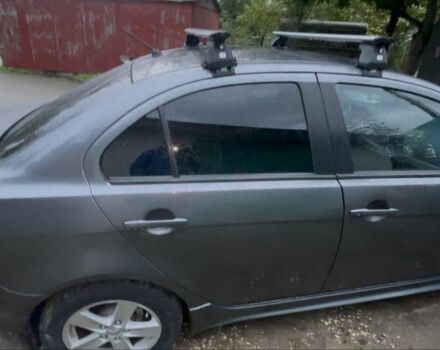 Сірий Міцубісі Lancer, об'ємом двигуна 2 л та пробігом 131 тис. км за 4200 $, фото 1 на Automoto.ua