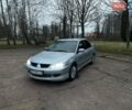 Сірий Міцубісі Lancer, об'ємом двигуна 1.6 л та пробігом 254 тис. км за 3800 $, фото 1 на Automoto.ua